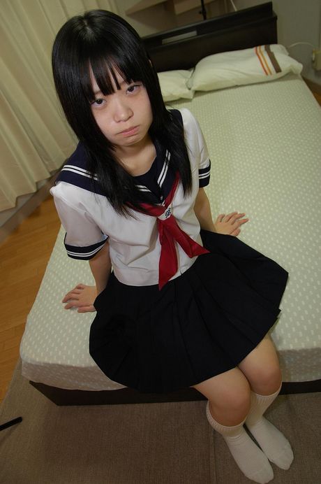 Innocent looking Japanese babe Rio Takei is getting her pussy fucked hard.